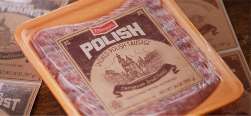pressure sensitive paper label on polish sausage package
